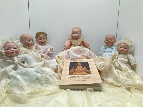 new book antique dolls guide values prices